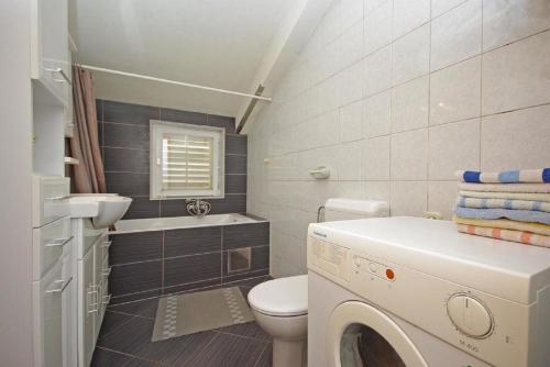 Kúpeľňa v ubytovaní Apartments Mila