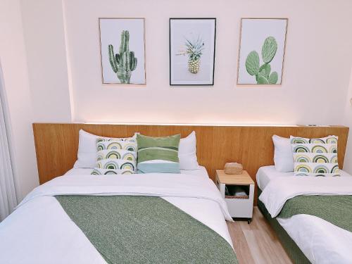 Postel nebo postele na pokoji v ubytování Gardenstay