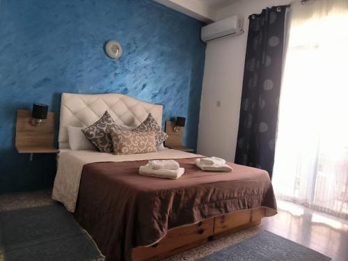 Postel nebo postele na pokoji v ubytování Tarona Guesthouse