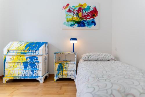 Katil atau katil-katil dalam bilik di NEST LIVING Dolce Luce