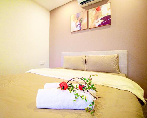Postel nebo postele na pokoji v ubytování Dứa's House - The Sóng Vũng Tàu, Sky Pool & Gym
