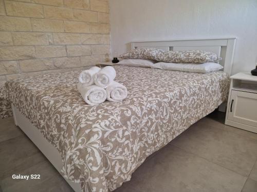 Ένα ή περισσότερα κρεβάτια σε δωμάτιο στο Ta' Marie Bed and Breakfast