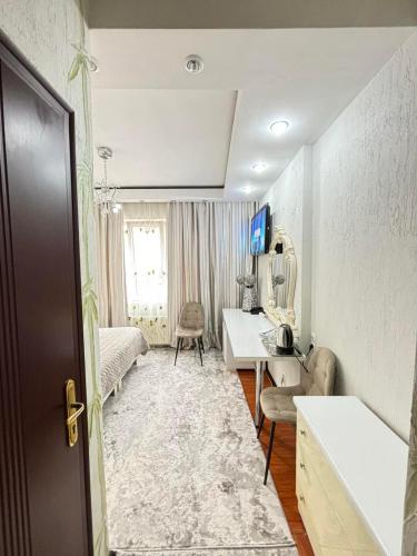 Postel nebo postele na pokoji v ubytování Bella Donna Hotel