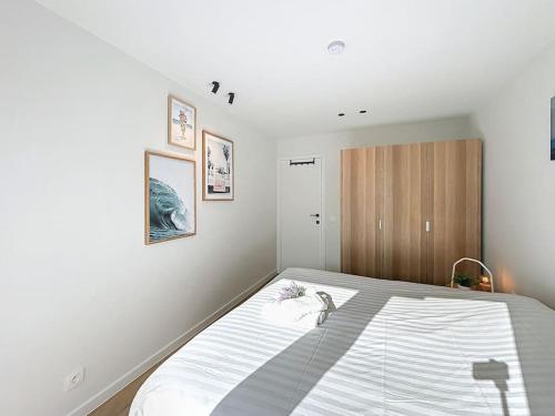 Una cama o camas en una habitación de Flat Sealodge - Koksijde