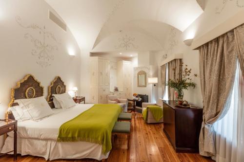 Postel nebo postele na pokoji v ubytování El Colibri - Relais & Châteaux