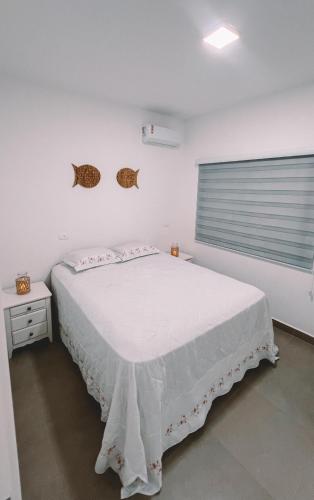 Postel nebo postele na pokoji v ubytování Casa com piscina a 200m da Praia - Império Correia - Itapoá