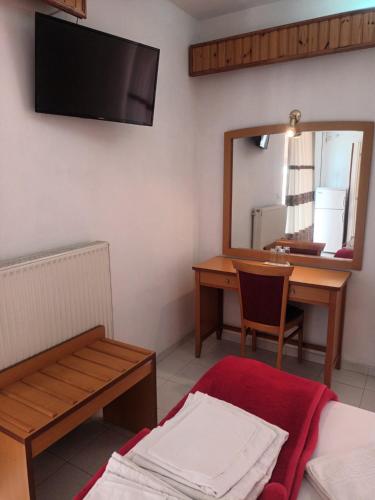 Postel nebo postele na pokoji v ubytování Diethnes SPA HOTEL