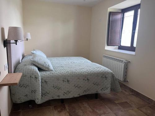 Postel nebo postele na pokoji v ubytování La Curtía del Neto