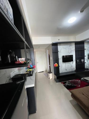 Kuchyň nebo kuchyňský kout v ubytování Apartemen breeze bintaro