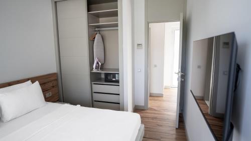 En eller flere senge i et værelse på Z-Villas Beach Hotel