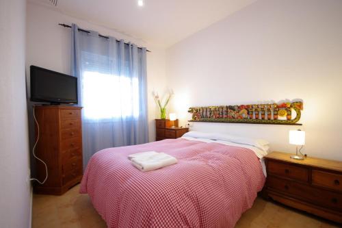 Postel nebo postele na pokoji v ubytování Livingtarifa- Apartamento Tucán