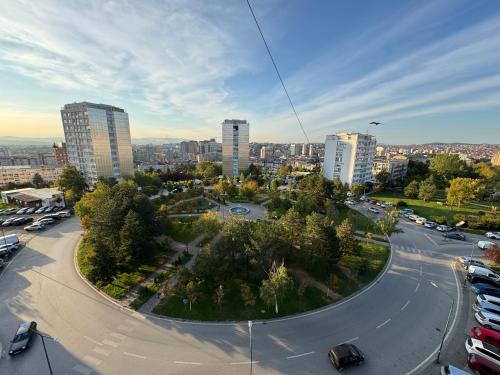 an aerial view of a city with tall buildings at Skyline Prishtina Studio Apartment in Pristina