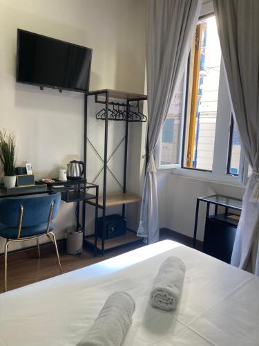 Postel nebo postele na pokoji v ubytování Brignole Diamond Rooms