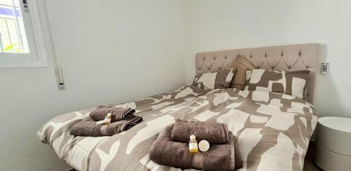 Postel nebo postele na pokoji v ubytování Lejlighed direkte til havet