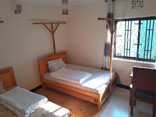 Postel nebo postele na pokoji v ubytování Anna's home stay