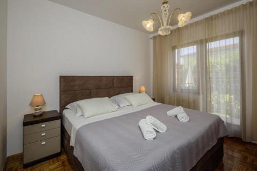 Postel nebo postele na pokoji v ubytování House Rafaeli