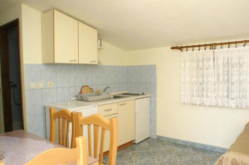 Kuchyňa alebo kuchynka v ubytovaní Apartments Barry