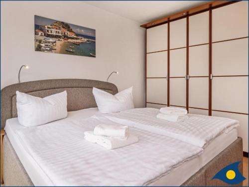 En eller flere senge i et værelse på Ferienwohnung Elias