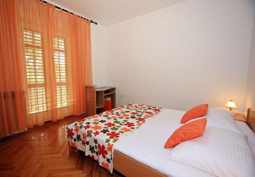 Ένα ή περισσότερα κρεβάτια σε δωμάτιο στο Apartment Neri
