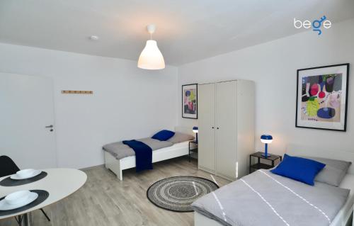 Katil atau katil-katil dalam bilik di BEGE APARTMENTS Company Base