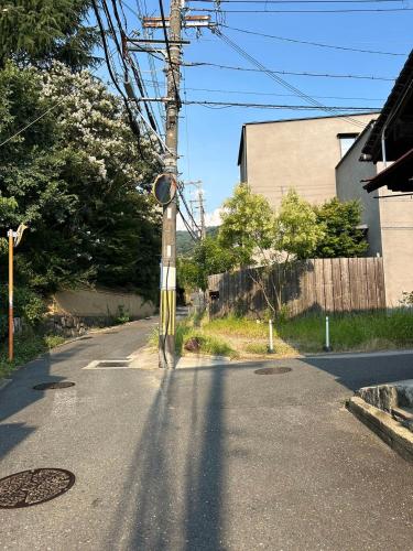 a pole in the middle of a street at ムラキン民泊 in Higashi-osaka