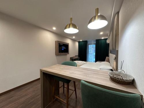 Μια τηλεόραση ή/και κέντρο ψυχαγωγίας στο Deluxe Family Apartment 24A