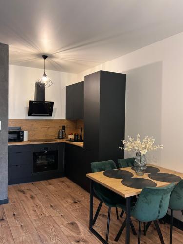 Η κουζίνα ή μικρή κουζίνα στο Loft Apartament Grudziądz