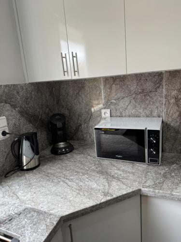 Una cocina o cocineta en Appartement Cosy proche Mer Saïdia