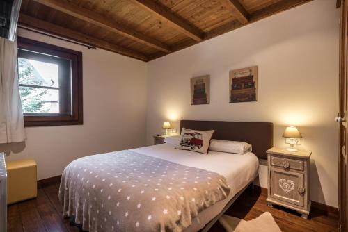 A bed or beds in a room at Colomers by Totiaran