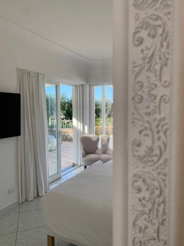 TV a/nebo společenská místnost v ubytování Bettola del Re home boutique b&b