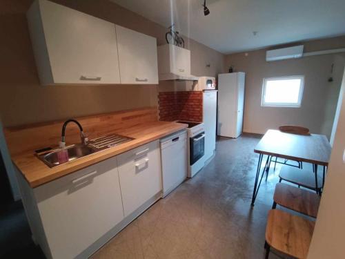 Dapur atau dapur kecil di Évasion rustique et confortable