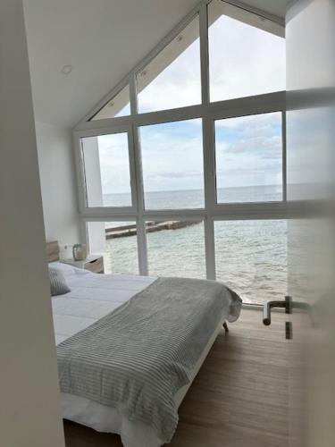 Ένα ή περισσότερα κρεβάτια σε δωμάτιο στο Casa dos Anjos
