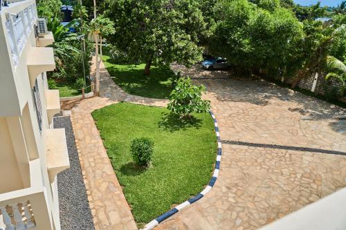 an aerial view of a yard with grass and trees at SHIMBA SPRINGS MBUYU. ( Malindi) in Malindi