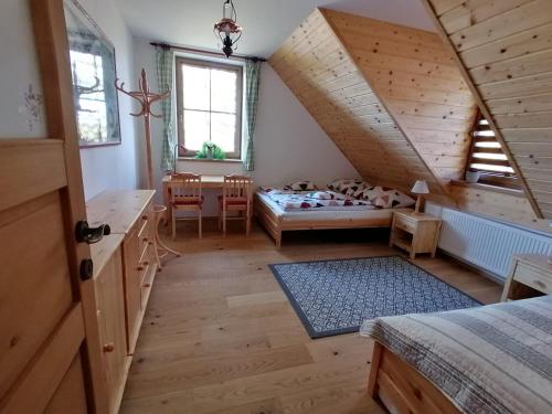 Postel nebo postele na pokoji v ubytování Chalupa U Maňouse