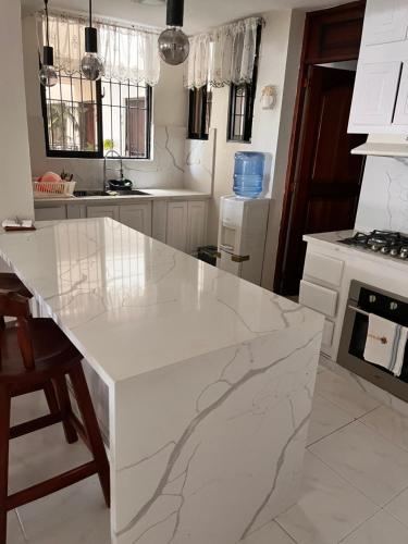 Kuchyň nebo kuchyňský kout v ubytování Apartamento amueblado en Villa Olga