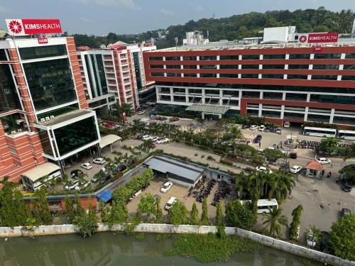 an aerial view of a city with tall buildings at Aami dhivahi guest house in Trivandrum