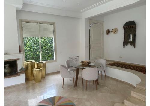 Posezení v ubytování Villa luxe avec piscine