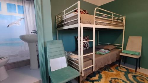 Postel nebo postele na pokoji v ubytování Rooster Run Guest House offers Vieques travelers newly furnished quaint affordable airconditioned rooms and only steps from the Ferry and nearby beaches