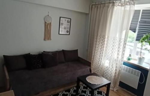 Khu vực ghế ngồi tại COZYMini Apartment