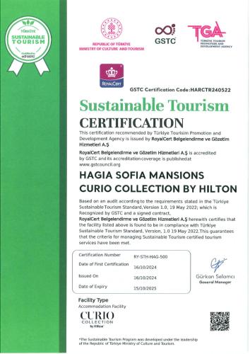 a green and white document with a certificate of qualification at Hagia Sofia Mansions Istanbul, Curio Collection by Hilton in Istanbul
