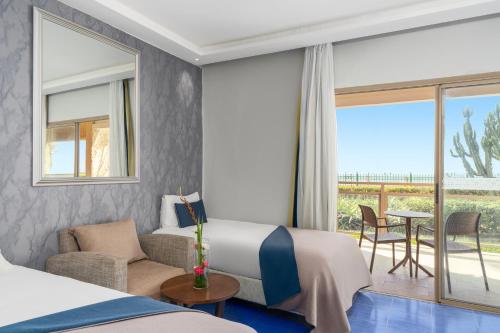 Postel nebo postele na pokoji v ubytování Dunes d'Or Ocean Club