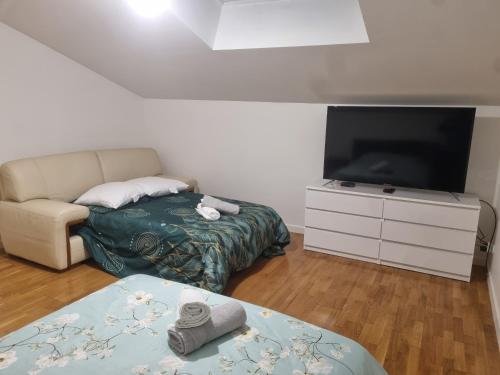 Postel nebo postele na pokoji v ubytování Summit GITE