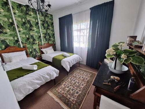 Ένα ή περισσότερα κρεβάτια σε δωμάτιο στο Benlamond Guest Farm