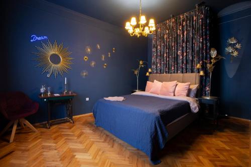 Ένα ή περισσότερα κρεβάτια σε δωμάτιο στο Fusion Apartments