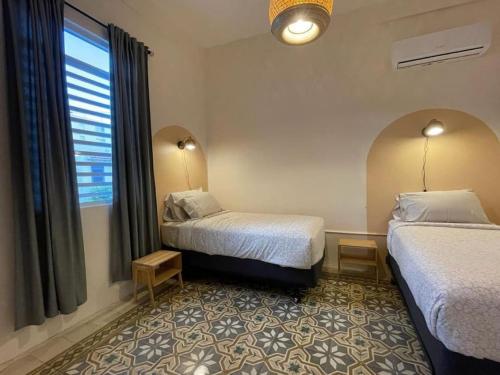 Ένα ή περισσότερα κρεβάτια σε δωμάτιο στο Chic and classic apartment in Santurce Apt 5