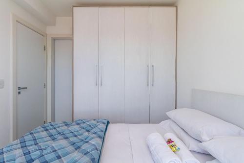 En eller flere senge i et værelse på Apartamento de 1 Quarto dos Simpsons - CEN2709