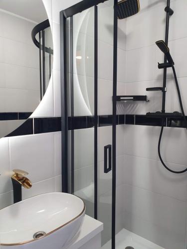 Koupelna v ubytování Tumski Apartments 24h self check-in