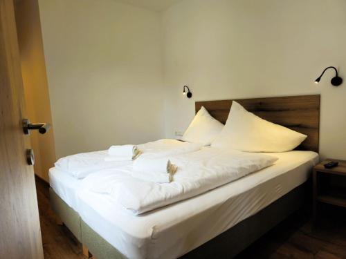 Katil atau katil-katil dalam bilik di Apartment Home Holzwurm by Interhome