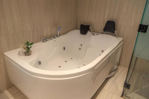 Un baño de Premium SAS Hotel