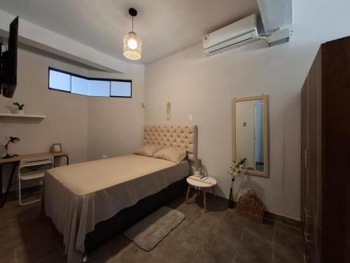 Postel nebo postele na pokoji v ubytování Linda Casita de Estreno en Tarapoto